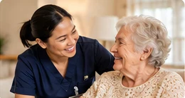 Care worker supporting an older person